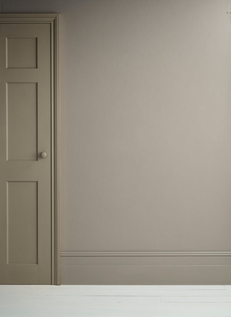 Lifestyle Image of Annie Sloan Satin Paint in French Linen used on door and skirting