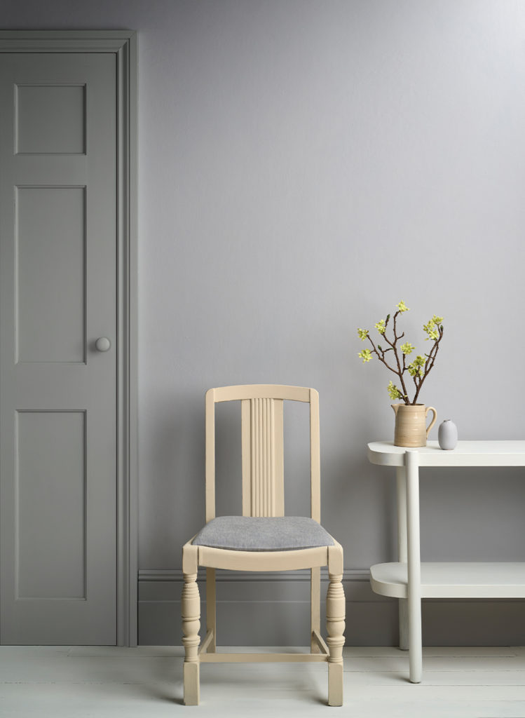 Lifestyle Image of Annie Sloan Satin Paint in Chicago Grey used on door and skirting