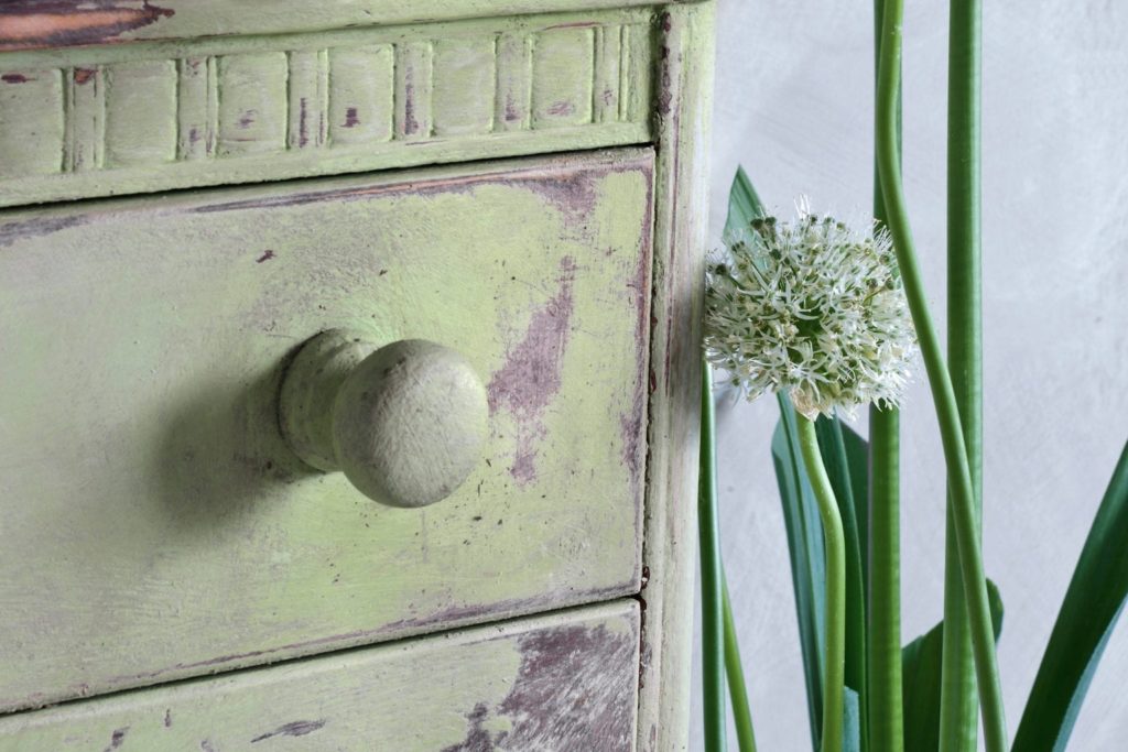 Chest of drawers painted with Chalk Paint® by Annie Sloan in Lem Lem and heavily distressed