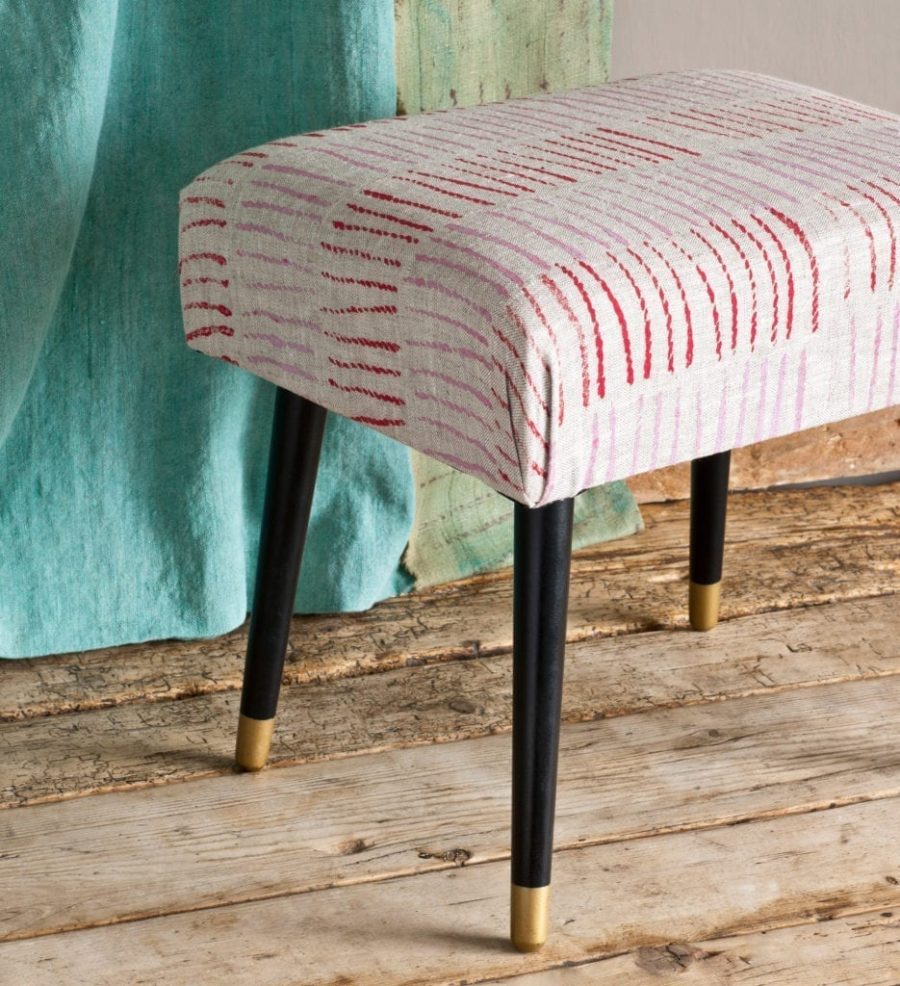 Footstool upholstered with fabric painted with Chalk Paint® furniture paint by Annie Sloan in Emperor's Silk and Henrietta