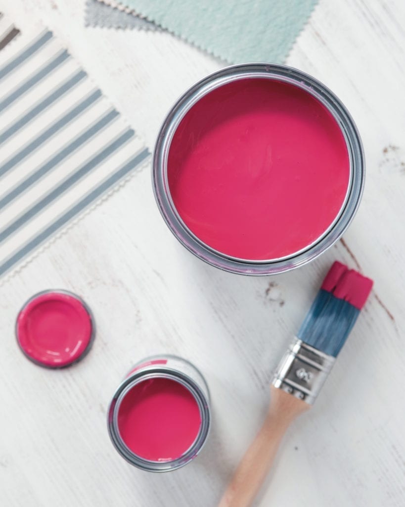 1 litre and 120ml tins of Capri Pink Chalk Paint® furniture paint by Annie Sloan, a bright, hot pink, flatly with fabric by Annie Sloan swatches