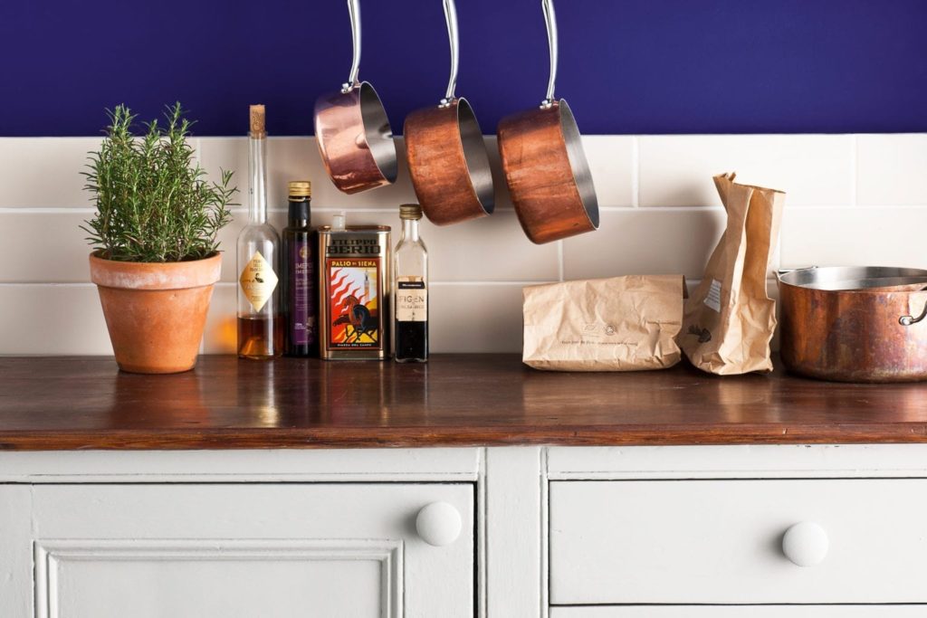 Wall Paint in Napoleonic Blue kitchen with cabinets painted with Chalk Paint® in Paris Grey