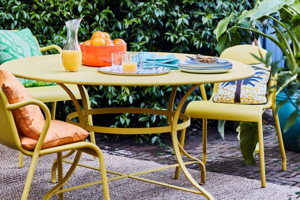 Outdoor garden dining furniture painted with Chalk Paint® by Annie Sloan in English Yellow
