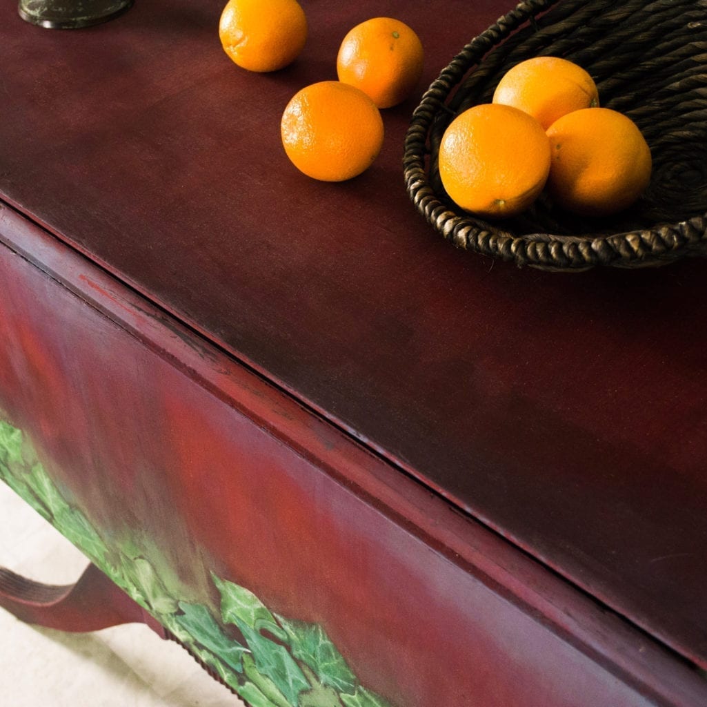 Drop Leaf Ivy Table by Annie Sloan Painter in Residence Girl in Blue Designs with Chalk Paint in reds and greens