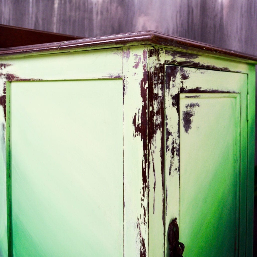 Green ombre distressed cabinet by Annie Sloan Painter in Residence Girl in Blue Designs painted with Chalk Paint® in Amsterdam Green, Antibes Green, and Lem Lem