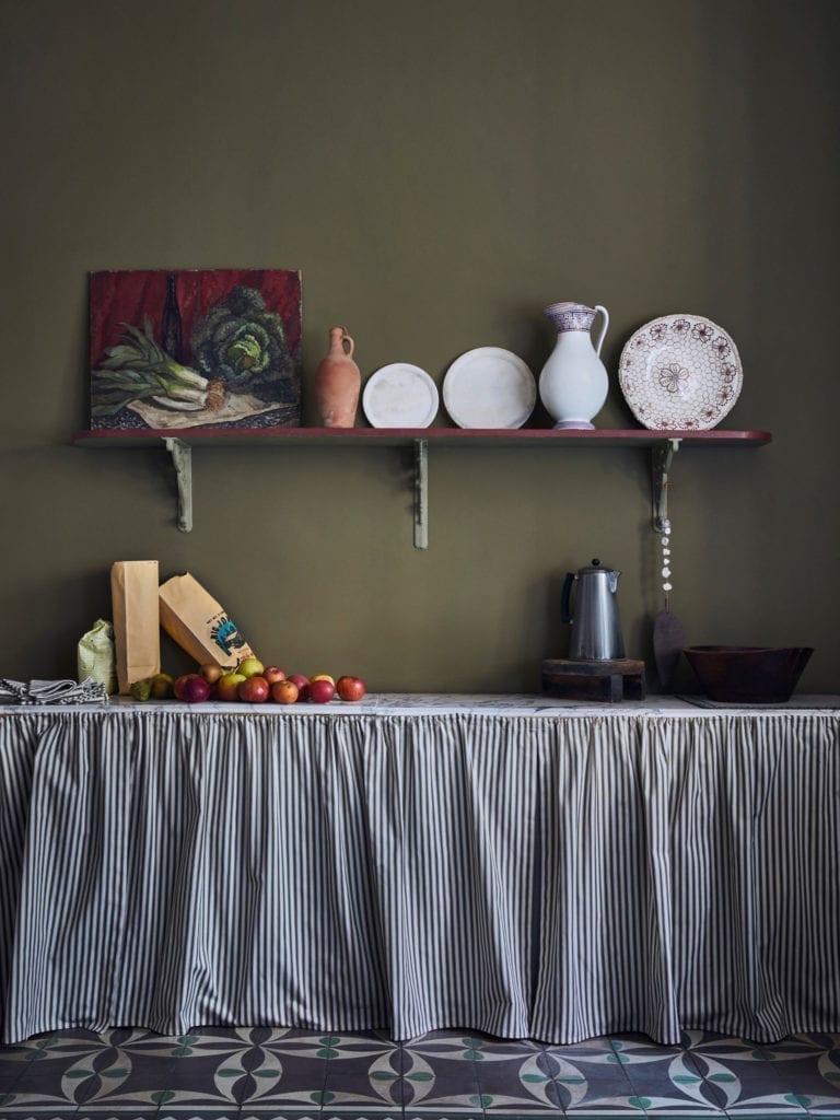 Farmhouse French-style kitchen painted with Chalk Paint® by Annie Sloan in Olive, finished with Ticking and patterned tiles