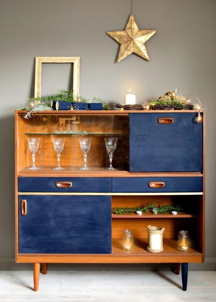 Mid Century Modern cabinet painted with Chalk Paint® by Annie Sloan in Oxford Navy, with Gilding Wax and Gold Leaf details for Christmas