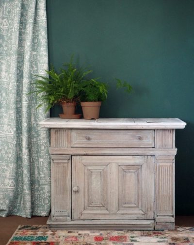 Washed oak cupboard with Chalk Paint® by Annie Sloan in Duck Egg Blue. Tacit in Duck Egg Blue curtain and Wall Paint in Amsterdam Green