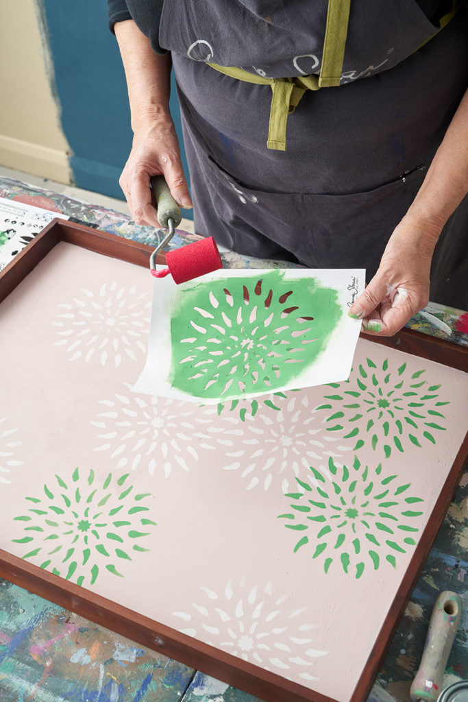 Annie Sloan using Antibes Green Chalk Paint® with the Floral Stencil found in every issue of The Colourist