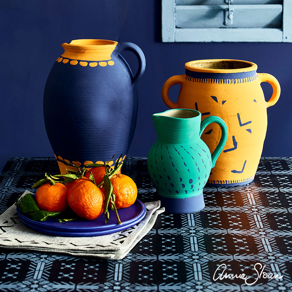 Barcelona Orange, Oxford Navy and Florence Chalk Paint® add some bright colour to the cool Oxford Navy mediterranean style stencilled table.