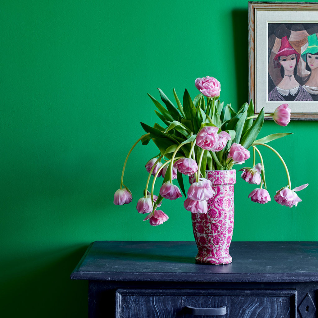 Annie Sloan Schinkel Green Wall Paint has been used to paint a living room. Features a sideboard painted in Chalk Paint® in Oxford Navy and Old White.