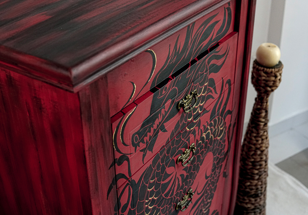 Chalk Paint in Emperor's Silk used as a base for Chest of Drawers. Athenian Black Chalk Paint and Gold Transfer Leaf used to paint a dragon motif across drawer front.