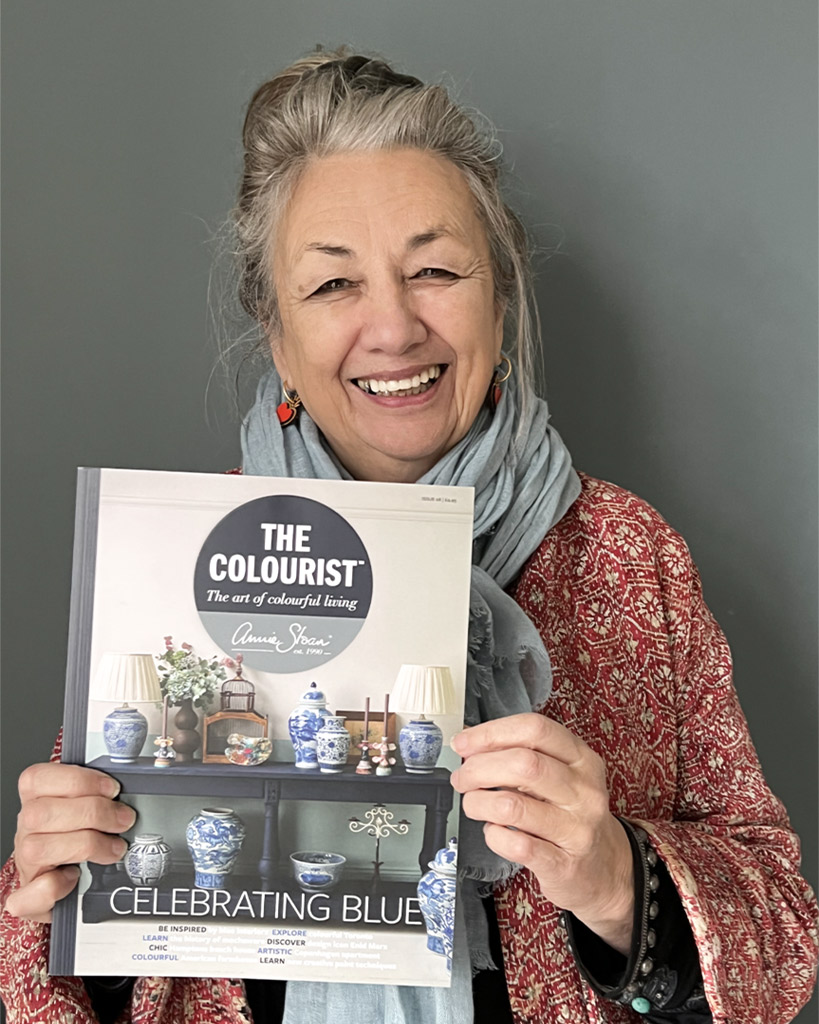 Annie Sloan holding a copy of The Colourist, Issue 8