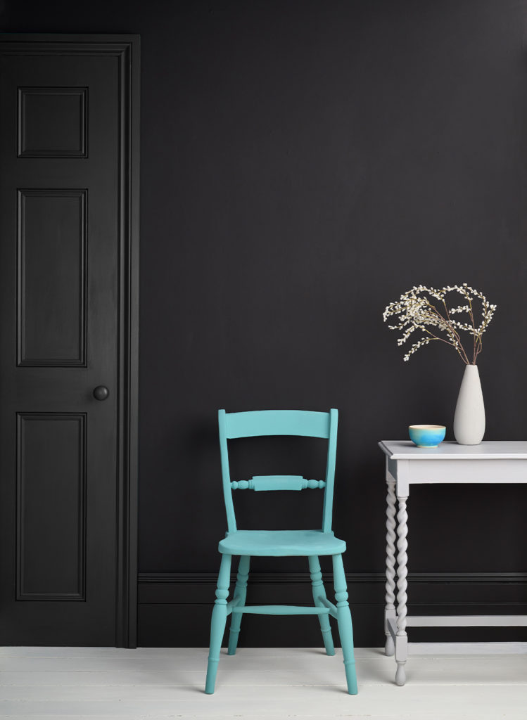 Lifestyle Image of Annie Sloan Satin Paint in Athenian Black used on door and skirting