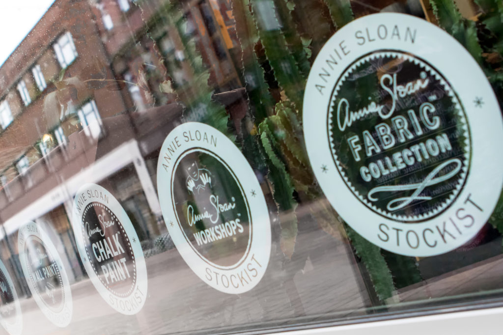 Annie Sloan Stockist window stickers on a store front