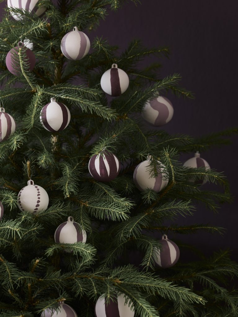 Striped Chalk Paint® Christmas Baubles Lifestyle Image on Christmas Tree Close Up