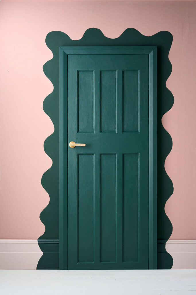 Annie Sloan wall paint used to create a pattern around a door frame