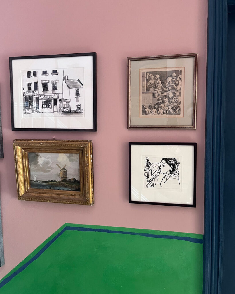 Annie Sloan's art in her hallway