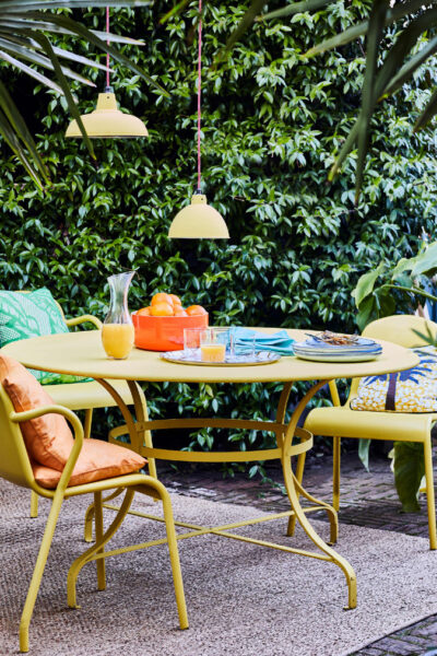 Annie Sloan Outdoor Dining Chalk Paint In English Yellow With Gloss Lacquer Lifestyle Portrait