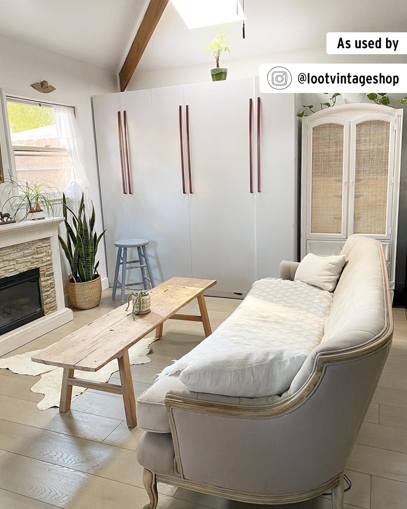 Pure White Chalk Paint used by an Annie Sloan stockist on a rattan cabinet, in a neutral lounge setting