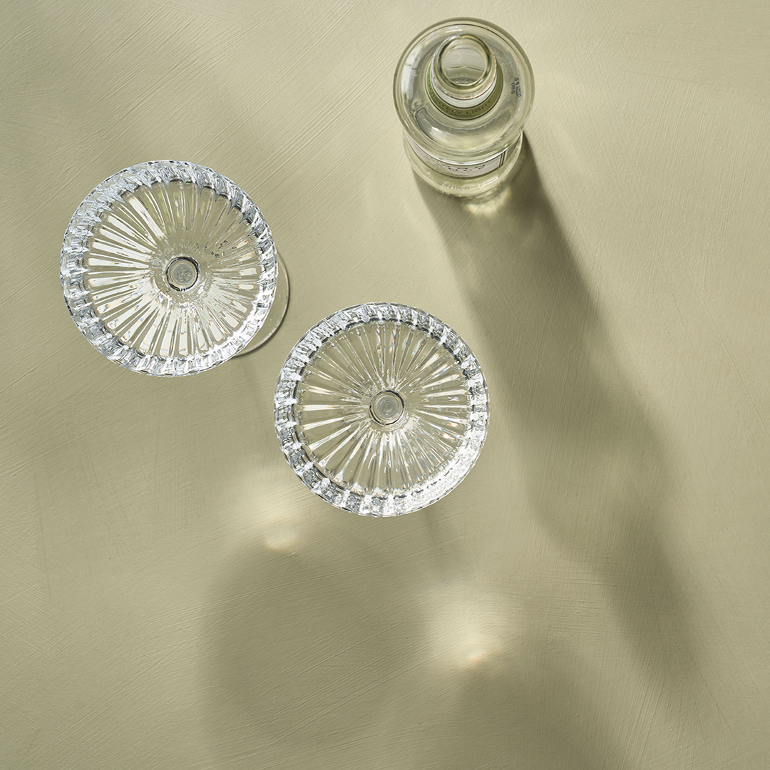 Chateau Grey table top with cocktail glasses, flat lay