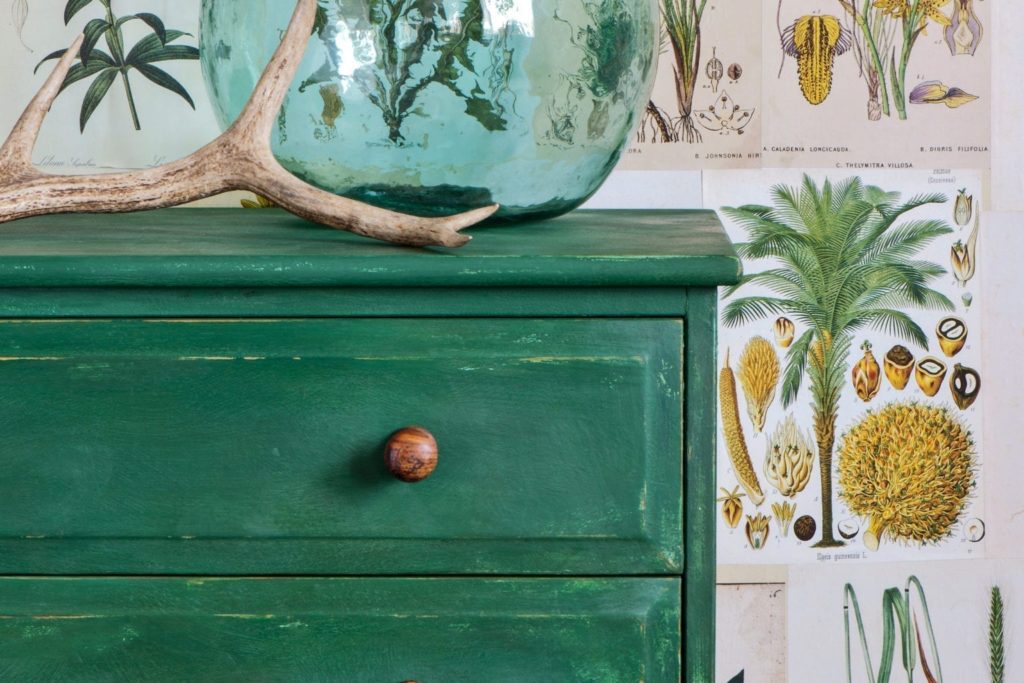 Chest of drawers painted with Chalk Paint by Annie Sloan in Amsterdam Green with botanical wall paper