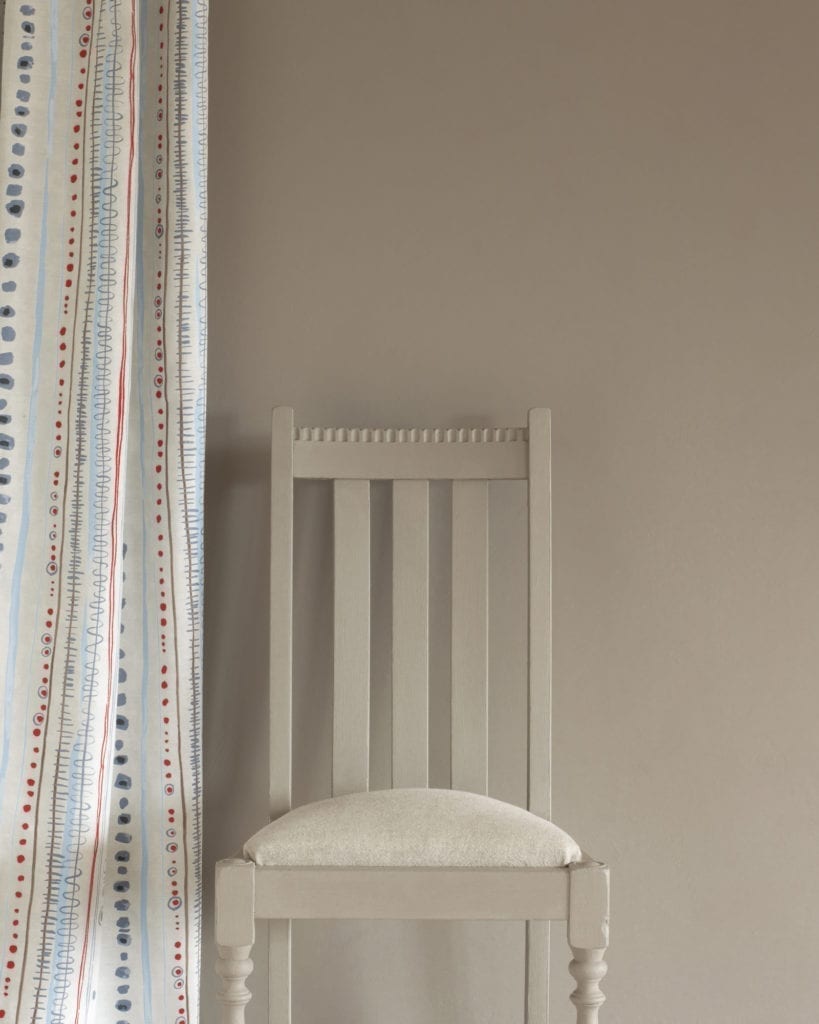 French Linen Wall Paint by Annie Sloan, chair painted with Chalk Paint® in French Linen, Piano in Old Violet curtain and seat cushion in Linen Union in Old White + French Linen