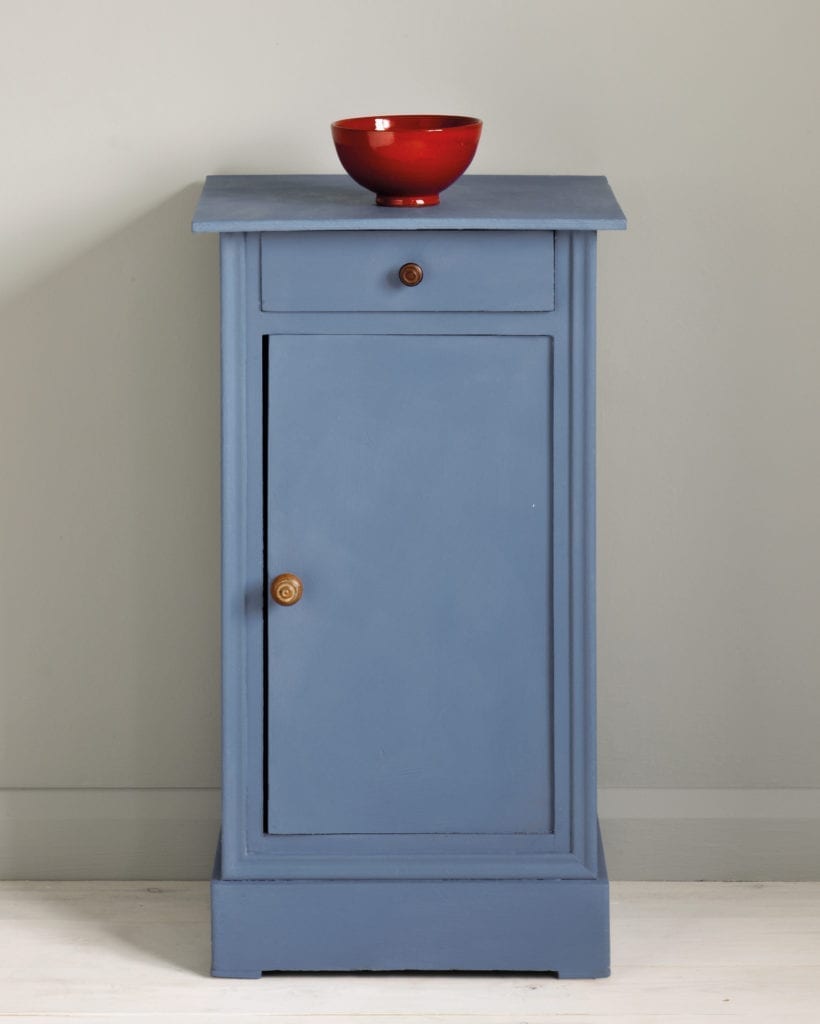 Side table painted with Chalk Paint® in Greek Blue, a fresh Mediterranean blue against a wall of Paris Grey