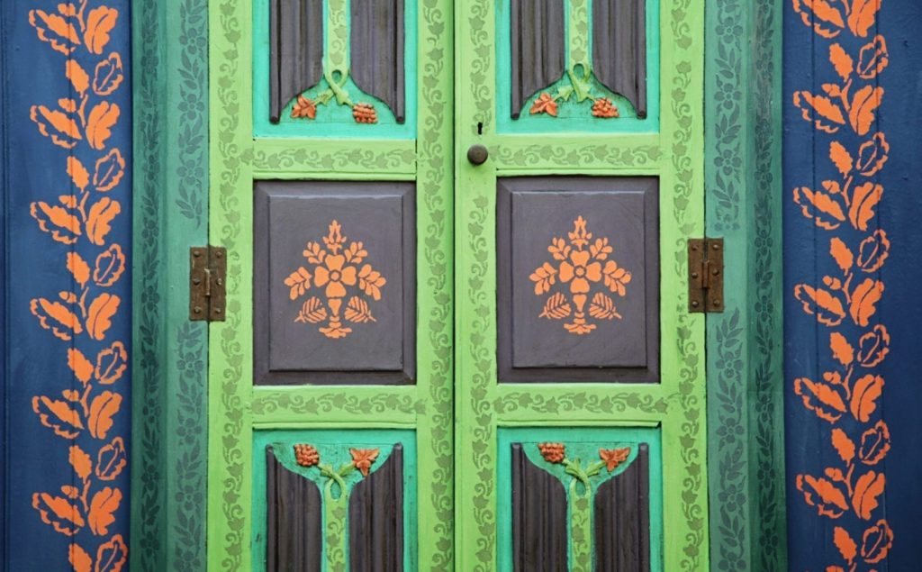 Boho Door by Annie Sloan Painter in Residence Janice Issitt painted and stencilled with Chalk Paint® in Florence, Antibes Green, Napoleonic Blue and Barcelona Orange