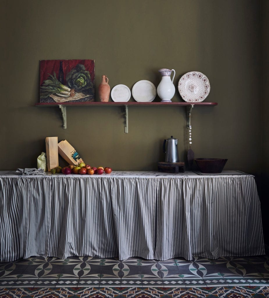 Farmhouse French-style kitchen painted with Chalk Paint® by Annie Sloan in Olive, finished with Ticking and patterned tiles