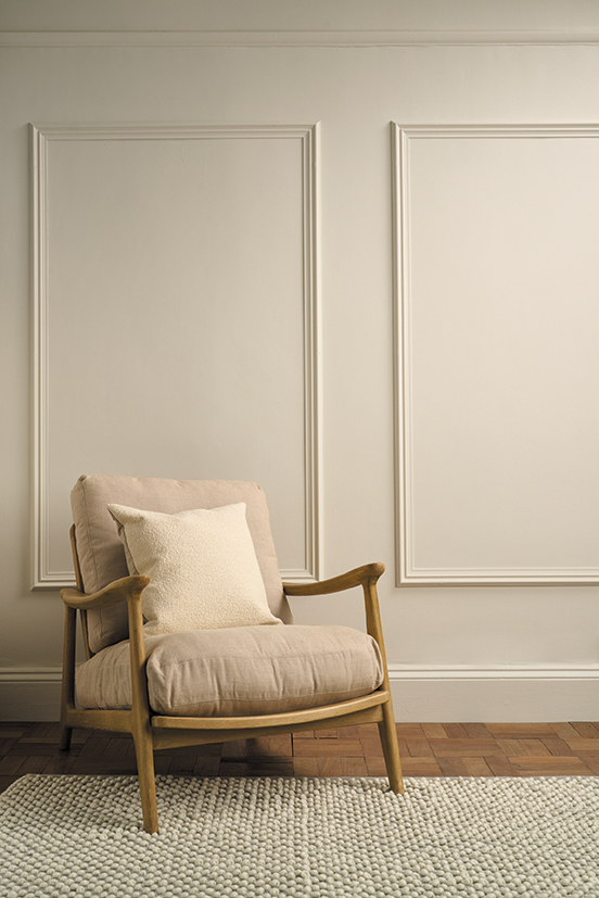 Old White Wall Painted used behind a chair, by Annie Sloan
