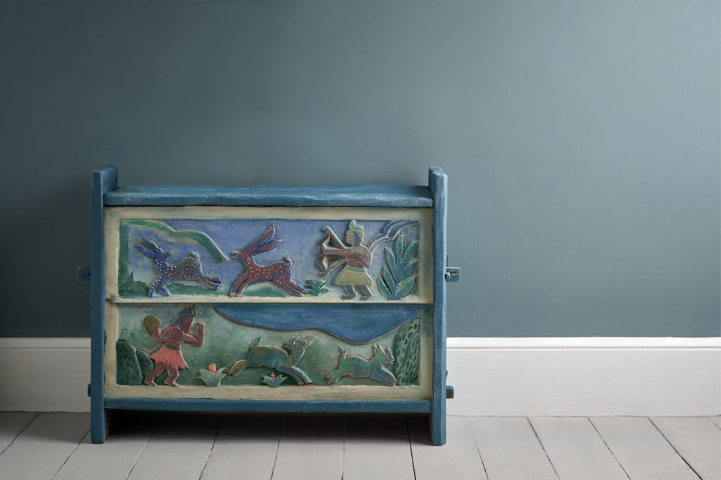 Annie Sloan Cambrian Blue Wall Paint with Chest in Foreground