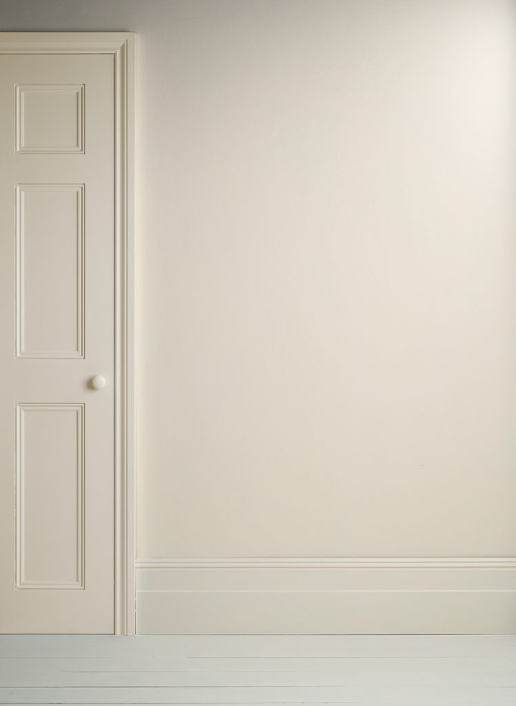 Lifestyle Image of Annie Sloan Satin Paint in Original used on door and skirting