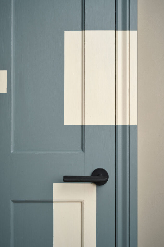 Annie Sloan Satin painted used to create a pattern effect on interior door - close up of Plank handle