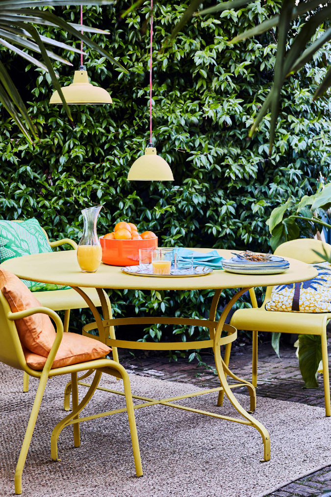 Annie Sloan Outdoor Dining Chalk Paint In English Yellow With Gloss Lacquer Lifestyle Portrait